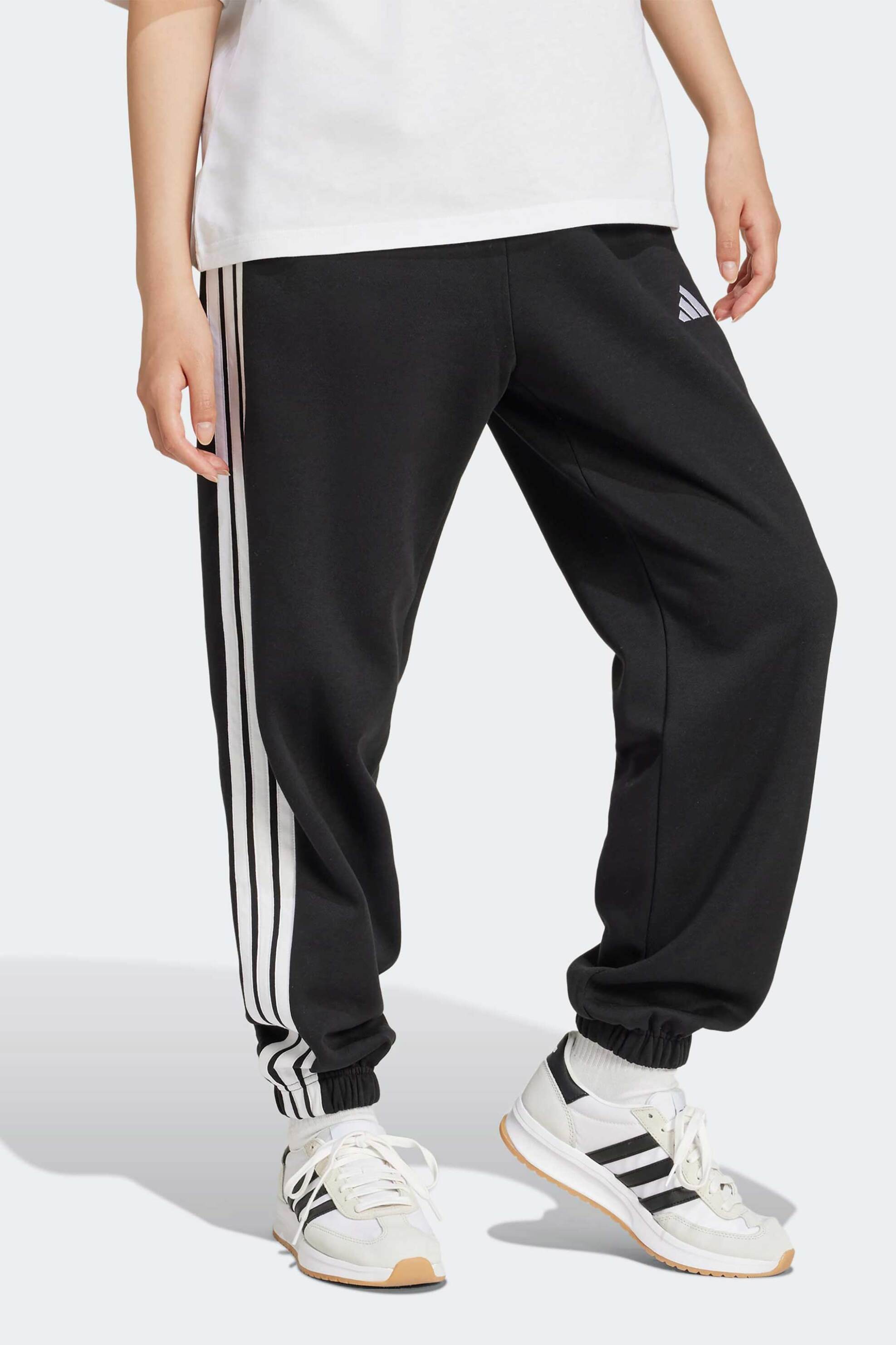 Adidas γυναικείο παντελόνι φόρμας Loose Fit "Essentials 3-Stripes Fleece"
